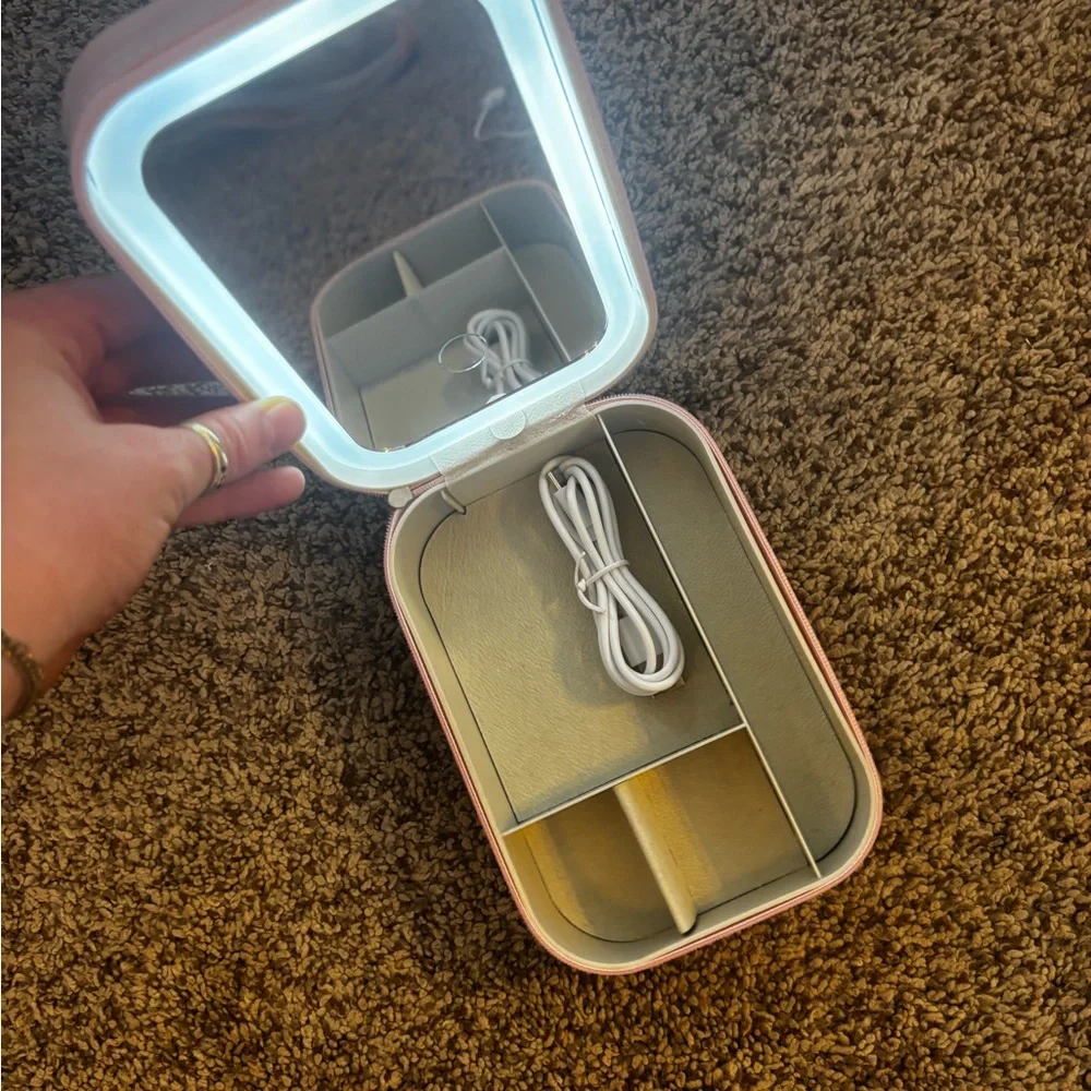 Portable Pink Makeup Mirror and jewelry organizer with LED Light